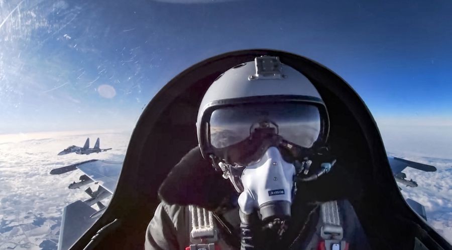 Moscow : This image taken from video and released by the Russian Defense Ministry Press Service on Monday, Feb. 7, 2022, shows a view from the cockpit of a Russian Su-30SM fighter jet as it flies over Belarus during joint drills. Moscow has deployed troops and weapons to Belarus, adding to a buildup of Russian forces near Ukraine that fueled fears of an invasion. AP/PTI