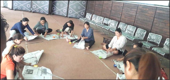 A paper bag making session in progress at CTC Hall on May 28. (Photo Courtesy: CAN Youth)