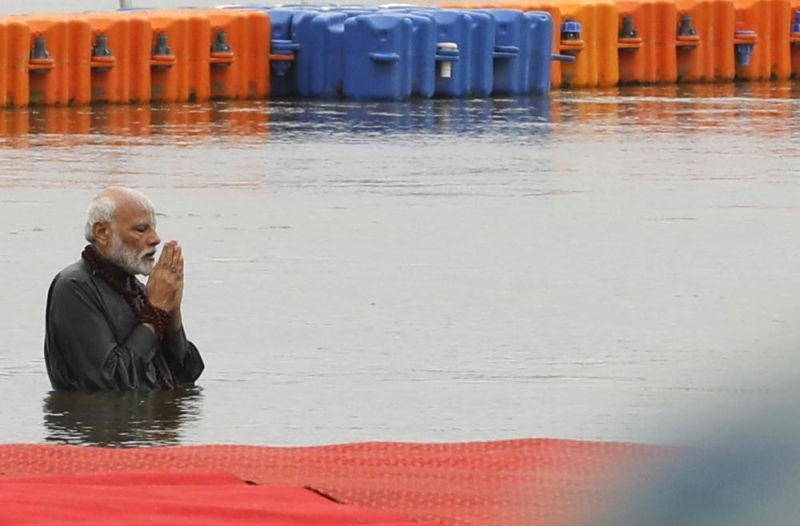 Indian Prime Minister Narendra Modi takes a holy dip at Sangam, the confluence of the Rivers Ganges, Yamuna and mythical Saraswati, during the Kumbh festival, in Allahabad. (AP File  Photo)