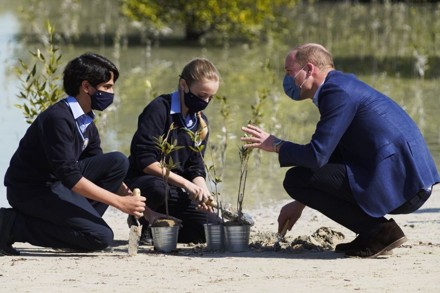 Abu Dhabi : Britain's Prince William talks to British School Al-Khubairat students Amaan Haider, 13, left, and Lilly-Rose Mayall, 12, at the Al-Jubail Mangrove Park in Abu Dhabi, United Arab Emirates, Thursday, Feb. 10, 2022. The prince on Thursday began his first official visit to the United Arab Emirates. AP/PTI