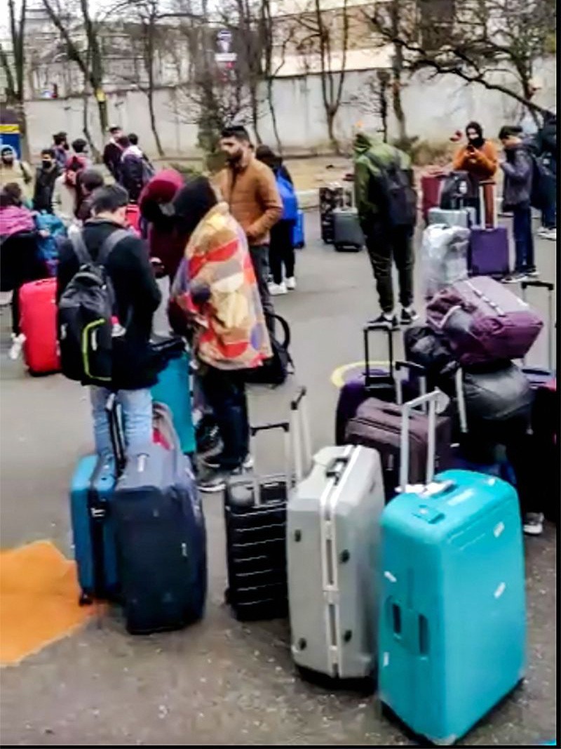 Indian nationals wait for rescue and relief operations amid Russia's military operation outside the Embassy of India, in Kyiv in Ukraine on February 24, 2022. (PTI Photo)