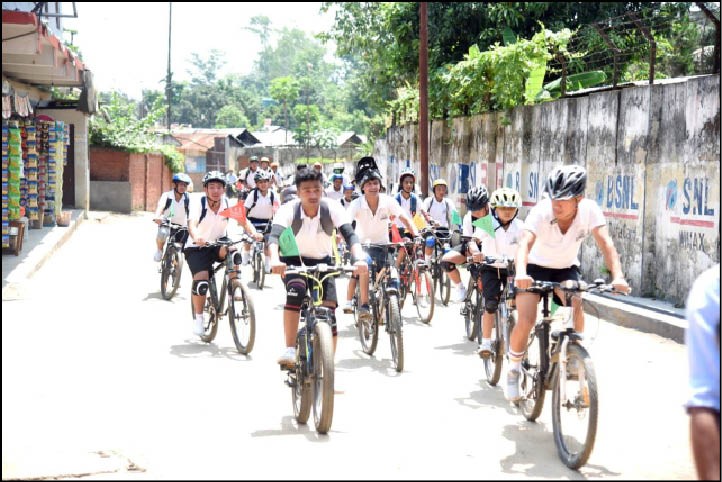 Students participate in the bicycle rally organised by Livingstone Foundation International under the theme ‘Our Environment, Our Concern’ on June 6. (Photo Courtesy: LFI)