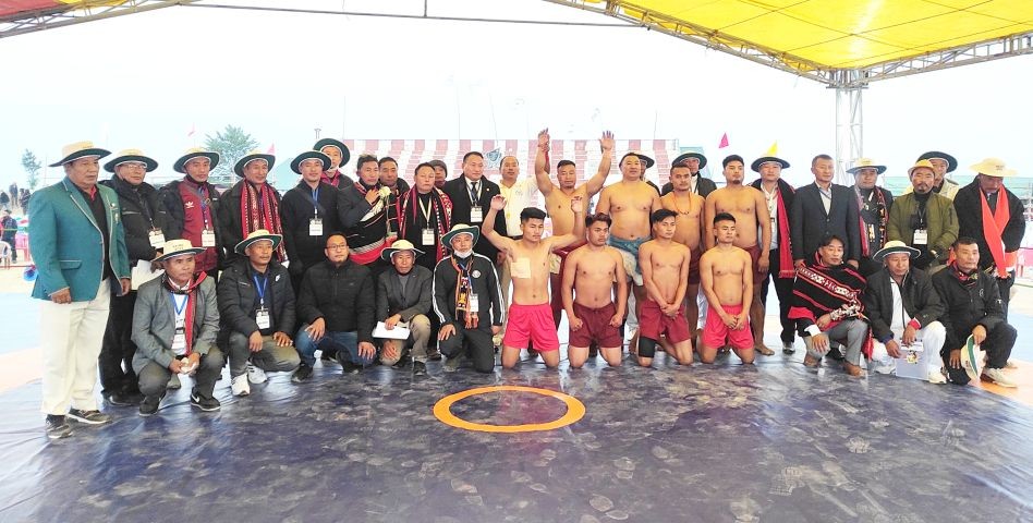 Winners of the Phek Area Wrestling Association along with the champion Vekutho Soho and Waku K Tara and others here at Phek Town on Tuesday.
