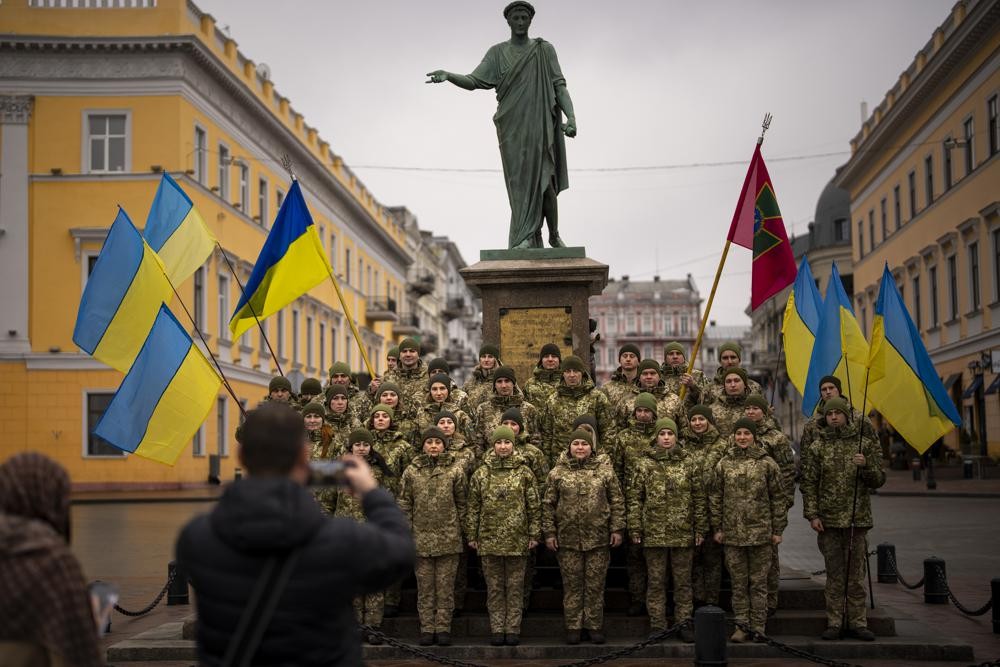Ukrainian Army soldiers pose for a photo as they gather to celebrate a Day of Unity in Odessa, Ukraine on February 16. (AP Photo)