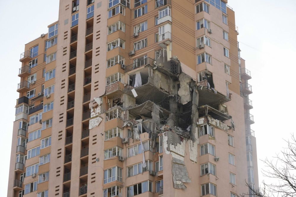 Kyiv: An apartment building damaged following a rocket attack on the city of Kyiv, Ukraine, Saturday, Feb. 26, 2022. Russian troops stormed toward Ukraine's capital Saturday, and street fighting broke out as city officials urged residents to take shelter. AP/PTI