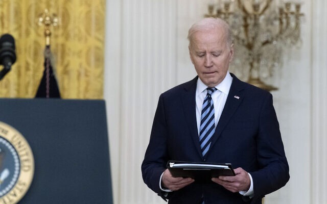 US President Joe Biden arrives to speak about the Russian invasion of Ukraine in the East Room of the White House, Thursday, Feb. 24, 2022, in Washington. (AP Photo/Alex Brandon)