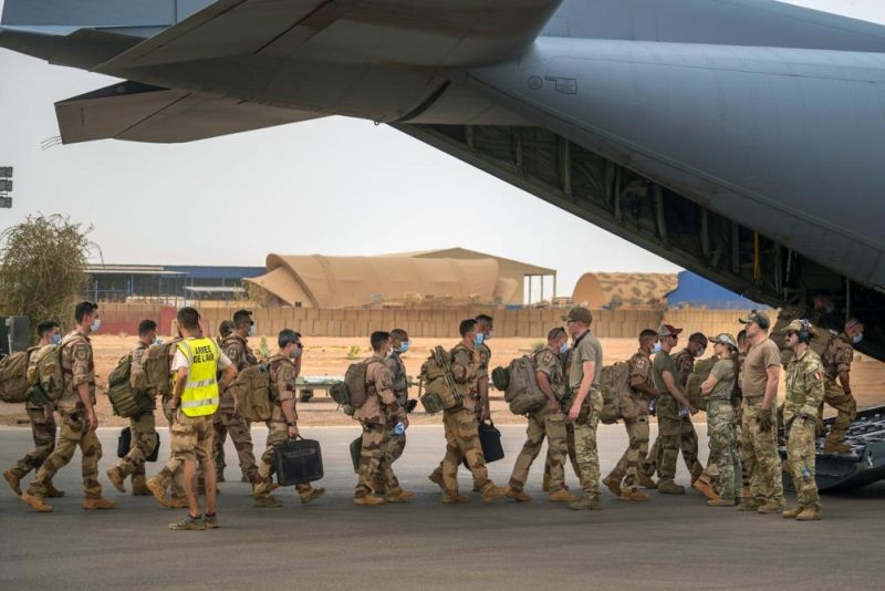 French Barkhane force soldiers who wrapped up a four-month tour of duty in the Sahel board a US Air Force C130 transport plane, leave their base in Gao, Mali Wednesday June 9, 2021. European leaders said troops from the European-led military task force known as Takuba will withdraw from Mali, while France is expected Thursday to announce the pullout of its own troops from the West African country. (AP File Photo)