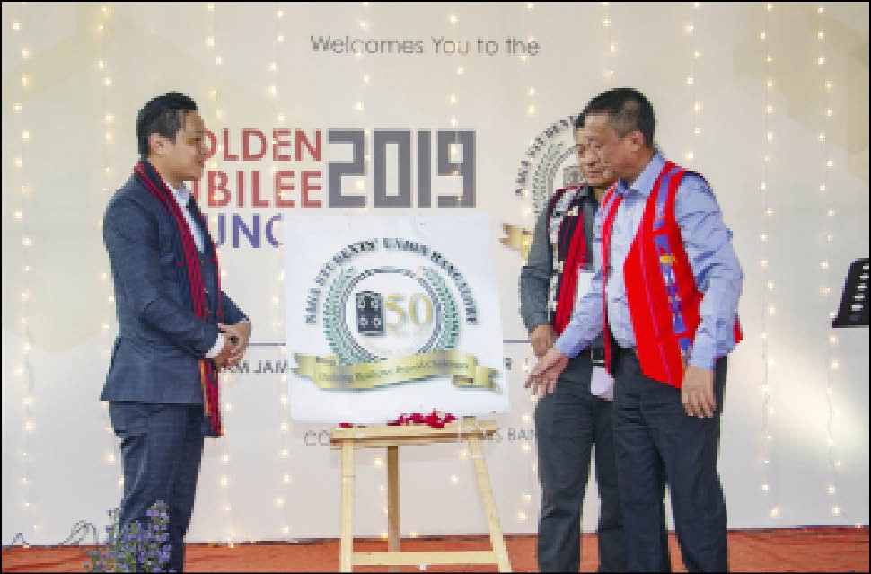 Thotngam Jamang, General Manager, RBI, Convener of NSUB Golden Jubilee, Bendangyanger and NSUB President unveiling the jubilee logo during the NSUB golden jubilee launch event held on February 23. (Photo Courtesy: NSUB)