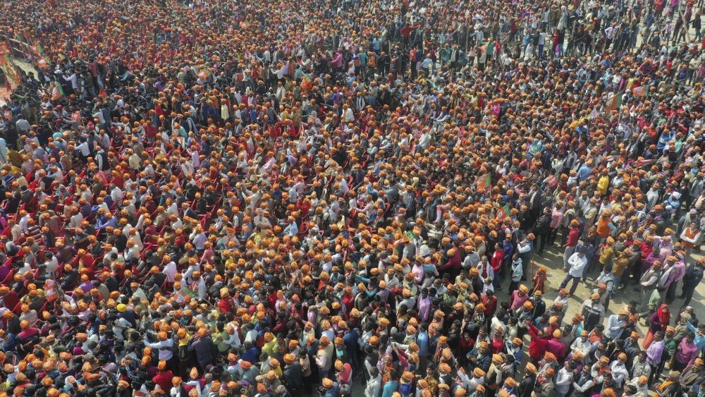 Lakhimpur Kheri: BJP supporters during an election campaign rally for state Assembly polls by Yogi Adityanath,in Lakhimpur Kheri district, Sunday, Feb. 20, 2022. (PTI Photo