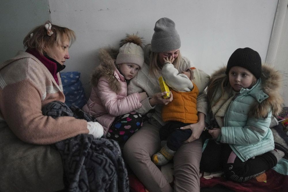 Mariupol: Women and children sit on the floor of a corridor in a hospital in Mariupol, eastern Ukraine Friday, March 11, 2022.AP/PTI Photo