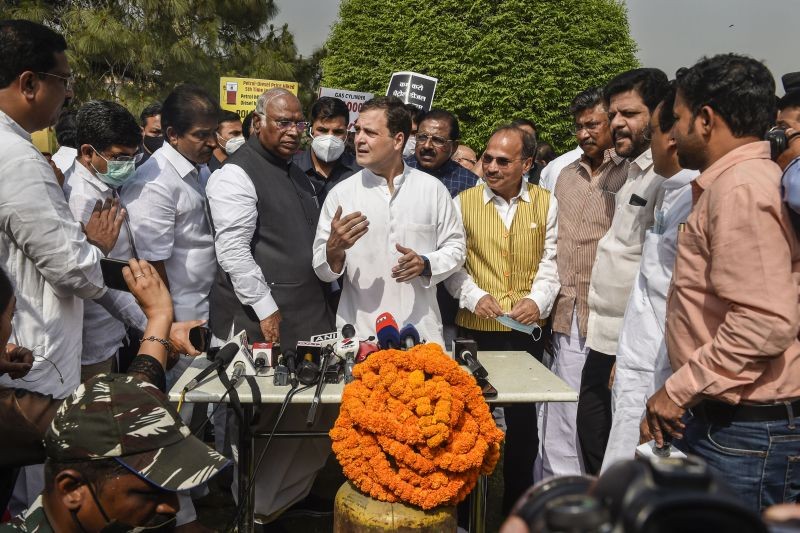 Congress leader Rahul Gandhi with Mallikarjun Kharge, Adhir Ranjan Chowdhury and other MPs addresses the media during a protest against fuel price hike, at Vijay Chowk in New Delhi on March 31, 2021. (PTI Photo)