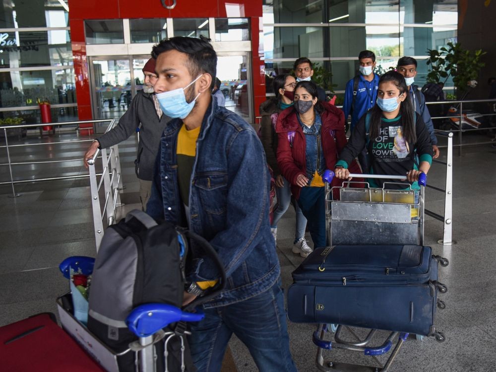 New Delhi: Students evacuated from war-torn Ukraine, on their arrival by an Operation Ganga Air India flight at the Indira Gandhi International Airport, in New Delhi, Tuesday, Mar 1, 2022. (PTI Photo/Shahbaz Khan)