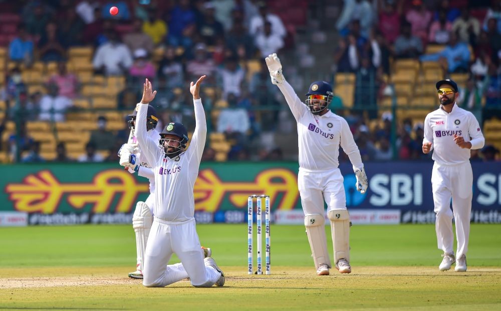 Bengaluru: India's Hanuma Vihari and teammates celebrate after he took the catch of Sri Lanka's batter Dhananjaya De Silva, during the third day of 2nd test cricket match between India and Sri Lanka at Chinnaswamy Stadium, in Bengaluru, Monday, March 14, 2022. (PTI Photo/Shailendra Bhojak)