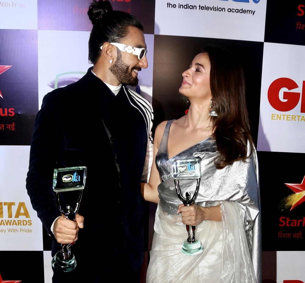 Mumbai: Bollywood actors Ranveer Singh and Alia Bhatt pose for photos with their awards at the ITA Awards 2022, in Mumbai, Sunday night, March 6, 2022. (PTI Photo)(