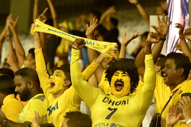 Chennai Super Kings fans cheer their team during match 7 of the Indian Premier League 2022 cricket tournament between the Lucknow Super Giants and the Chennai Super Kings, at the Brabourne Stadium in Mumbai on March 31, 2022. (PTI Photo)