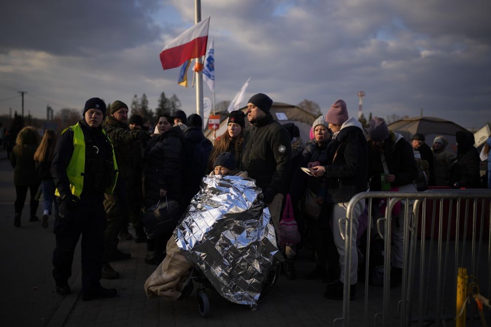 Medyka : Refugees fleeing war in neighboring Ukraine arrive at the Medyka border crossing, Poland, Thursday, March 10, 2022. AP/PTI