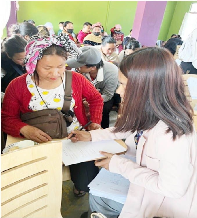 Woman vendor filling up questionnaire during the ‘Uplifting Women Street Vendors’ organised by Entrepreneurs Associates and supported by Capri Global Capital Limited on March 7.