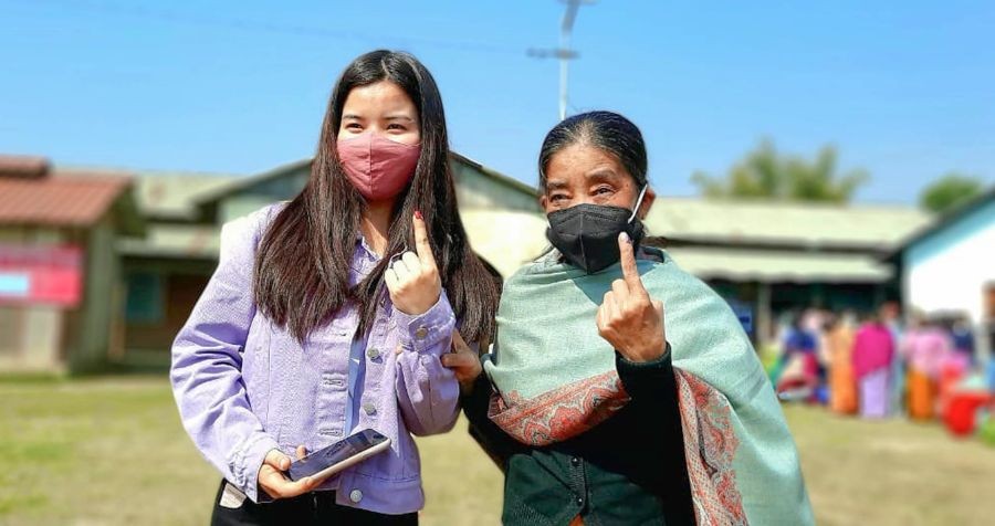 Manipur: Women show their fingers marked with indelible ink after casting their vote during the second phase of Manipur Assembly elections, Saturday, March 5, 2022. (PTI Photo)