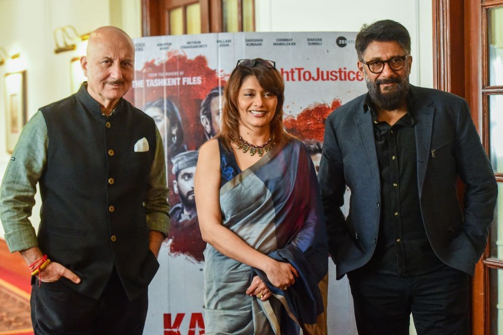 New Delhi: (L-R) Bollywood actors Anupam Kher and Pallavi Joshi with Film Director Vivek Agnihotri pose for photographs during Kashmir Files press conference at a hotel in New Delhi, Monday, March 14, 2022. (PTI Photo/Kamal Kishore)(