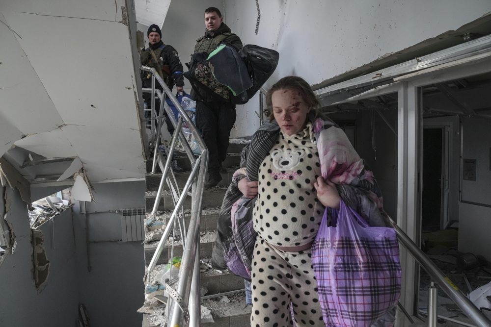 Mariupol: An injured pregnant woman walks downstairs in a maternity hospital damaged by shelling in Mariupol, Ukraine, Wednesday, March 9, 2022. AP/PTI