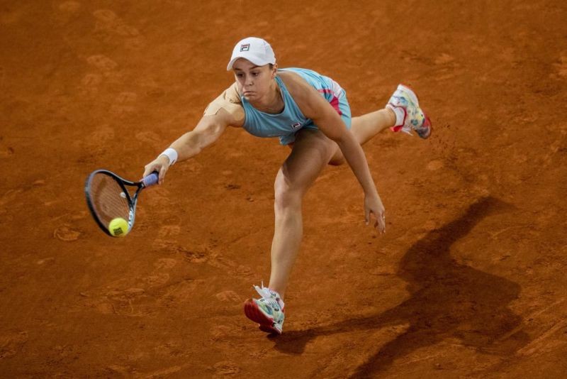 Australia's Ashleigh Barty returns the ball to U.S. Shelby Rogers during their match at the Mutua Madrid Open tennis tournament in Madrid, Spain on April 29, 2021. In a shock announcement on March 23, 2022, No. 1-ranked Barty announced her retirement from tennis. (AP File Photo)
