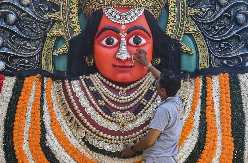 An artist gives final touches to a goddess Durga idol ahead of the Gudi Padwa Festival, in Mumbai on March 31, 2022. The festival of Gudi Padwa marks the beginning of the Marathi New Year. (PTI Photo)