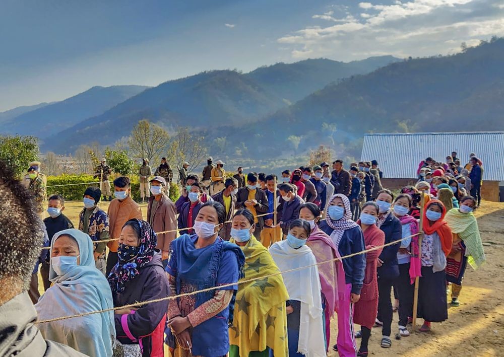 Senapati: People wait to cast their votes for Assemply elections, during repolling in Senapati, Manipur, Tuesday, March 8, 2022. (PTI Photo)