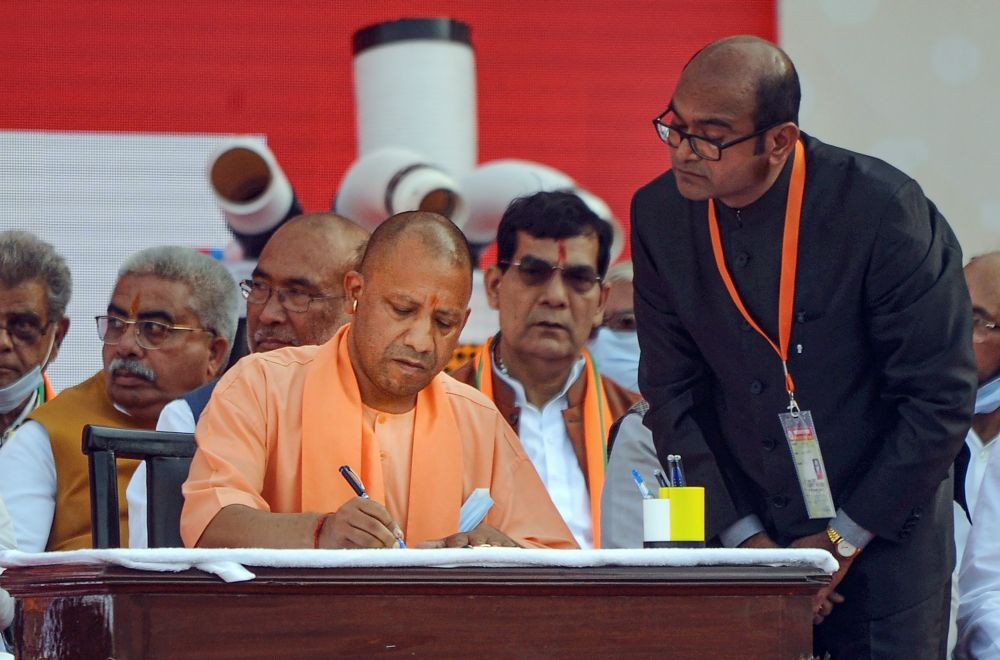 Yogi takes oath as UP CM; Maurya, Pathak his deputies