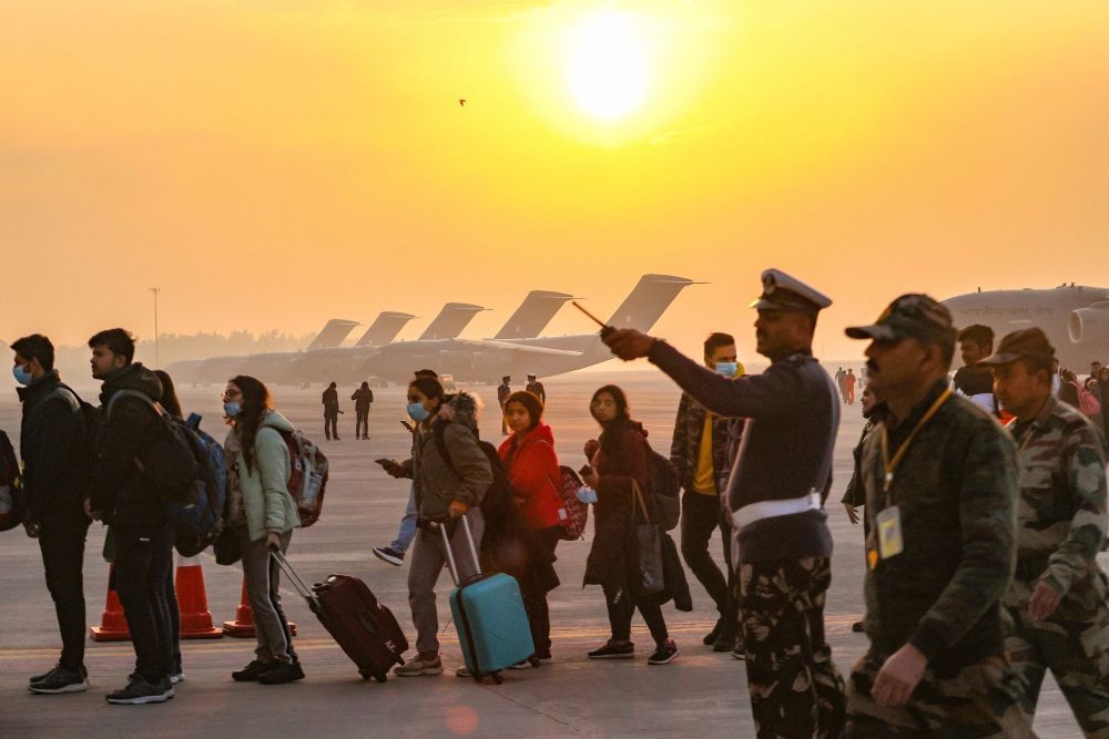 Ghaziabad: Indian nationals, evacuated from crisis-hit Ukraine, upon their arrival at the Hindon Air Force Station in Ghaziabad, early Thursday, March 3, 2022. As part of Operation Ganga, the first IAF C-17 Globemaster aircraft carrying 200 passengers, mostly students returned to Hindan airbase near Delhi, from Bucharest at around 1:00 AM. (PTI Photo)