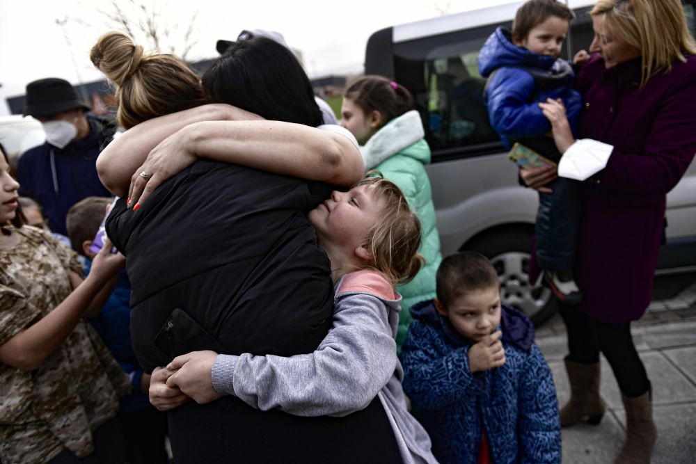 Cizur Menor : Ukrainian Irina Oscaria, 21 years, resident in Spain, hugs her family after they arrived in Cizur Menor, northern Spain, Tuesday, March 15, 2022, after Russian's invasion of Ukraine. Oscaria's family traveled more than five thousands kilometers to arrive in Spain. AP/PTI
