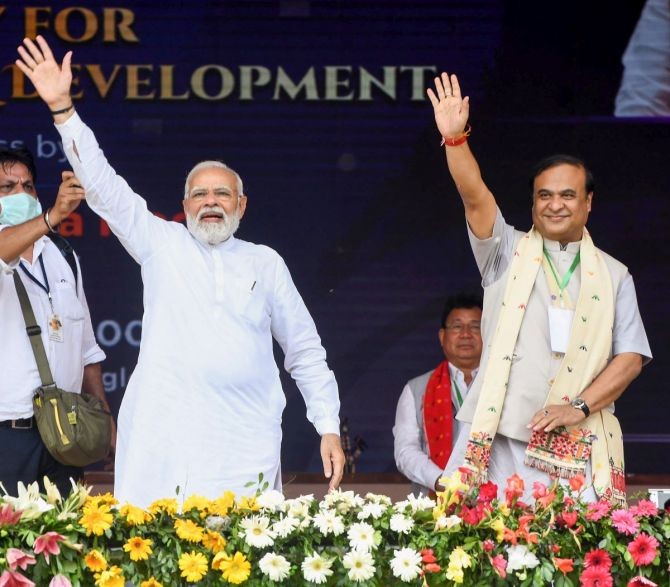 Prime Minister Narendra Modi with Assam Chief Minister Himanta Biswa Sarma during the ‘unity, peace and development rally’ at Loringthepi in Karbi Anglong district, April 28, 2022. Photograph: PTI Photo