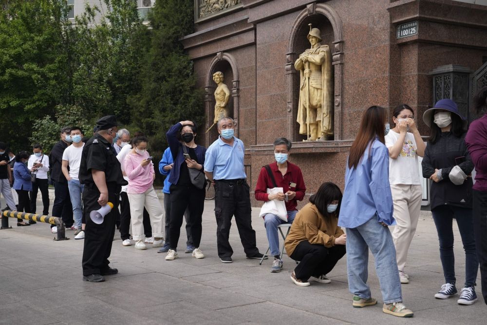 Beijing starts mass Covid testing as Shanghai reports highest deaths