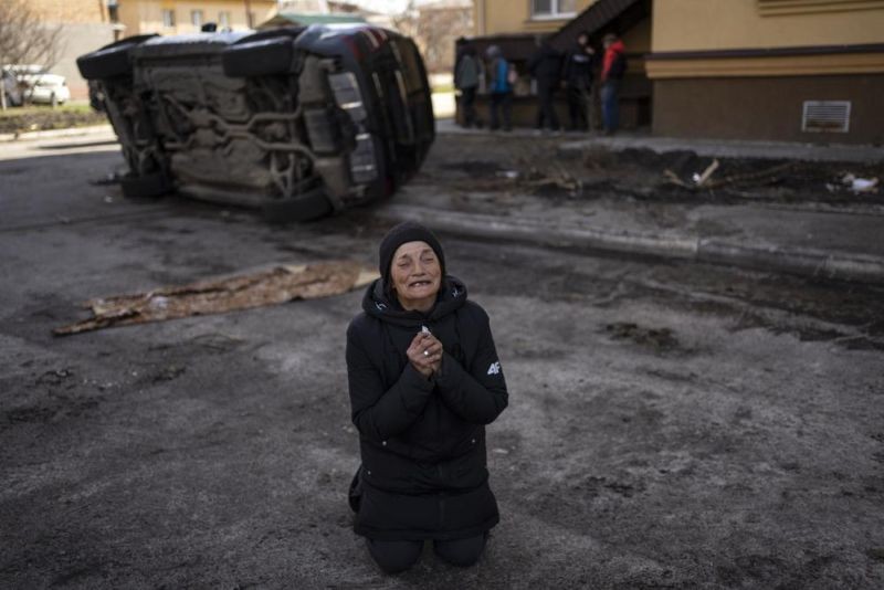 Tanya Nedashkivs'ka, 57, mourns the death of her husband, killed in Bucha, on the outskirts of Kyiv, Ukraine on April 4, 2022. Russia is facing a fresh wave of condemnation after evidence emerged of what appeared to be deliberate killings of civilians in Ukraine. (AP Photo)