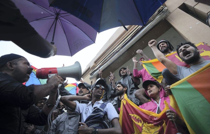 Sri Lankans demanding president Gotabaya Rajapaksa resign over the debt-ridden country's worst economic crisis protest outside the president's office in Colombo, Sri Lanka on April 10, 2022. (AP/PTI Photo)
