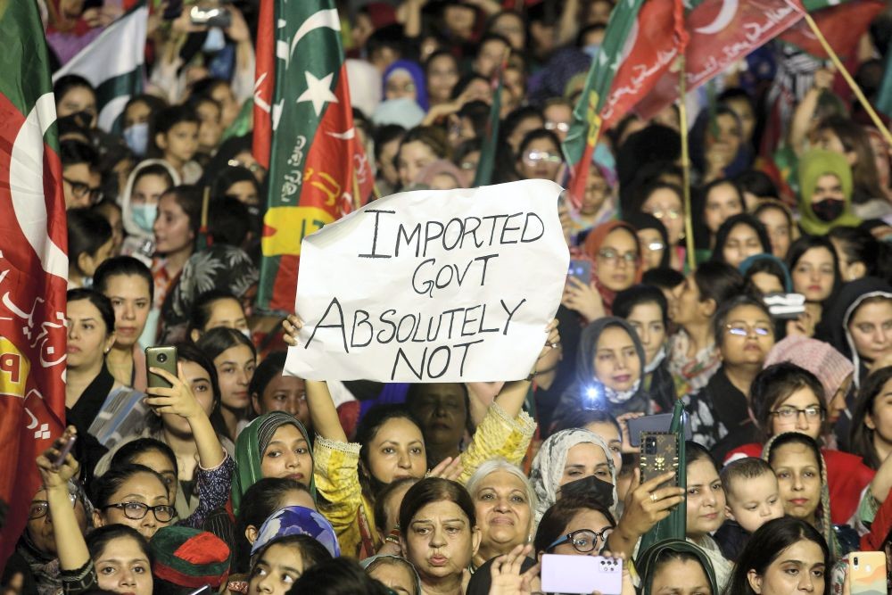 Supporters of deposed Prime Minister Imran Khan's party participate in a rally to condemn the ouster of their leader's government, in Karachi, Pakistan, Sunday, April 10, 2022. With the parliamentary no-confidence vote against Khan early Sunday, he called on supporters to take to the streets in protest and the political opposition preparing to install his replacement. (AP Photo/Fareed Khan)