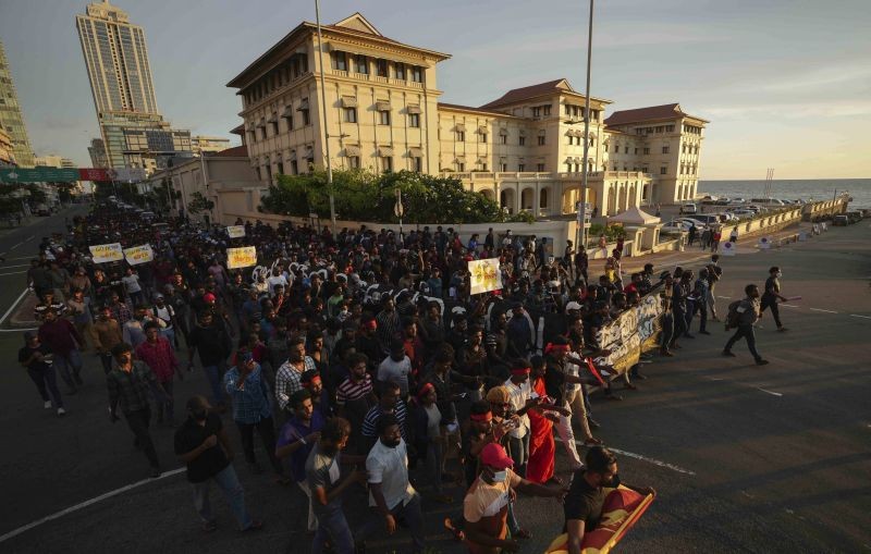 Sri Lankan university students march during a protest over the country's worst economic crisis in decades outside the residence of prime minister Mahinda Rajapaksa in Colombo, Sri Lanka on April 24, 2022. (AP/PTI Photo)