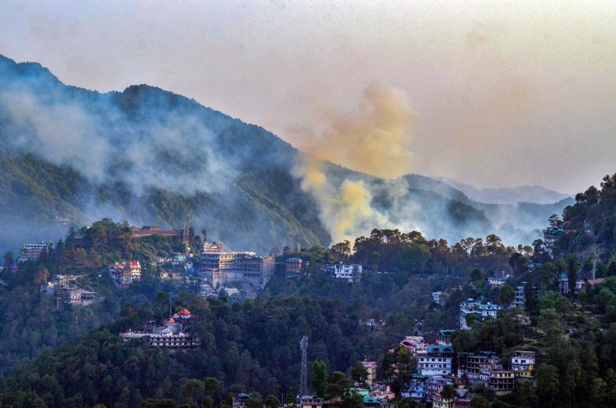 Shimla: Smoke rises from a fire in the forest area of Taradevi, in Shimla, Monday, April 18, 2022. (PTI Photo)(