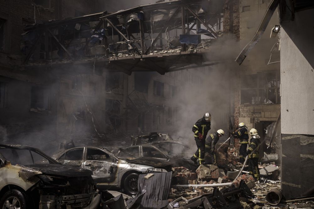 Russians strike 8 Ukrainian cities, hit depot
