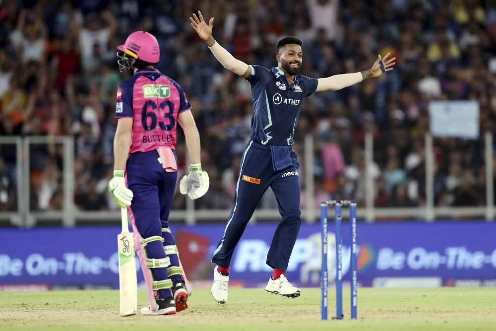 Ahmedabad: Hardik Pandya of Gujarat Titans celebrates the wicket of Jos Buttler of Rajasthan Royals during the final T20 cricket match of the Indian Premier League 2022 (IPL season 15), between the Gujarat Titans and the Rajasthan Royals, at the Narendra Modi Stadium, Ahmedabad, Sunday, May 29, 2022. (Sportzpics/PTI Photo)(