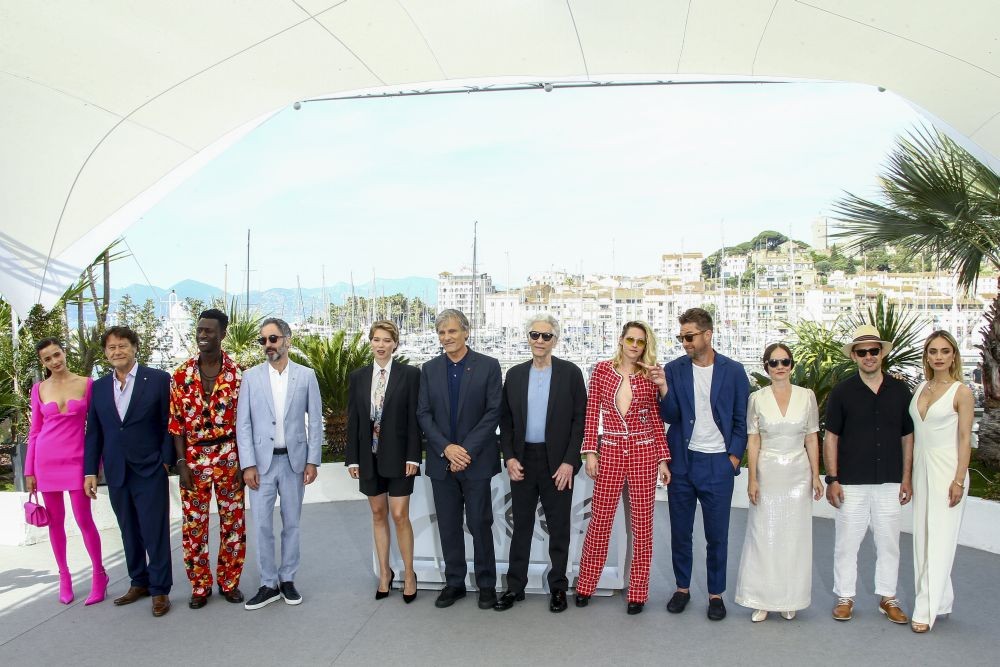 Lihi Kornowski, from left, producer Robert Lantos, Welket Bungue, Don McKellar, Lea Seydoux, Viggo Mortensen, director David Cronenberg, Kristen Stewart, Scott Speedman, Nadia Litz, Giorgos Pyrpassopoulos, and Denise Capezza poses for photographers at the photo call for the film 'Crimes of the Future' at the 75th international film festival, Cannes, southern France, Tuesday, May 24, 2022. AP/PTI