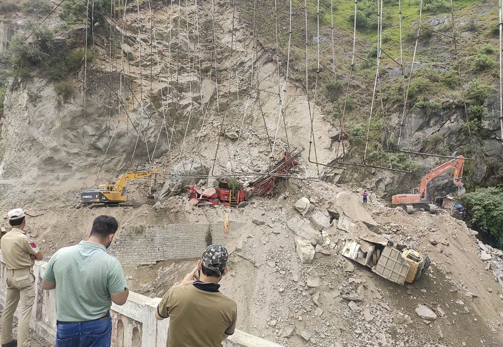 Ramban: Rescue operation underway after a portion of an under-construction tunnel on the Jammu-Srinagar national highway collapsed near Magarkote in Ramban district, Friday, May 20, 2022. The incident took place on Thursday night. (PTI Photo)