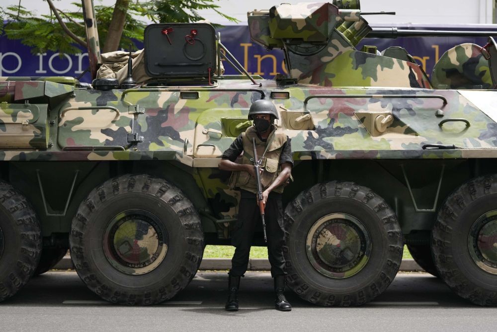 Colombo: A Sri Lankan army soldier stands guard on a street in Colombo, Sri Lanka, Saturday, May 14, 2022. Protesters attacked earlier this week by supporters of Sri Lanka‚Äôs government are demanding that the newly appointed prime minister arrest his predecessor for allegedly instigating the attack against them as they called for his resignation. AP/PTI