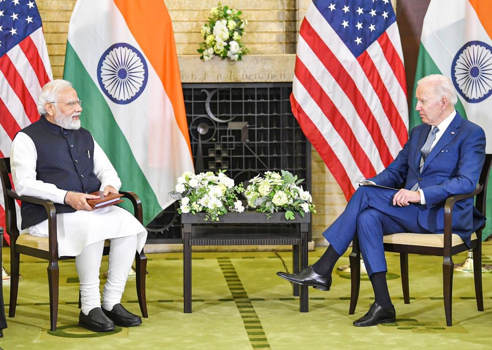 **EDS: IMAGE POSTED BY @PMOIndia** Tokyo: Prime Minister Narendra Modi and US President Joe Biden hold talks on the sidelines of Quad Summit meeting, in Tokyo, Tuesday, May 24, 2022. (PTI Photo)