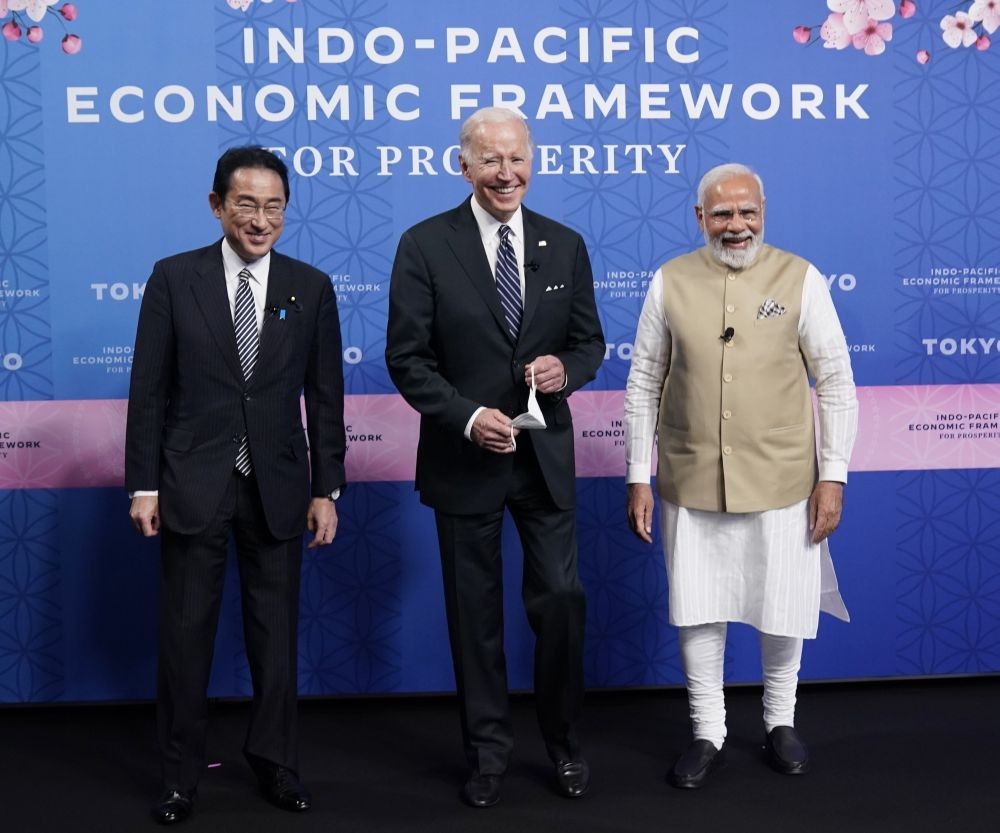 Japanese Prime Minister Fumio Kishida, left, President Joe Biden and Indian Prime Minister Narendra Modi pose for photos as they arrive at the Indo-Pacific Economic Framework for Prosperity launch event at the Izumi Garden Gallery, Monday, May 23, 2022, in Tokyo. AP/PTI(