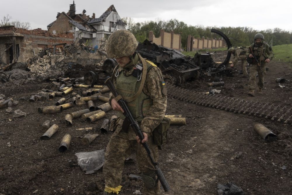 Kharkiv: Ukrainian servicemen patrol in a recently retaken village, north of Kharkiv, east Ukraine, Sunday, May 15, 2022. AP/PTI(