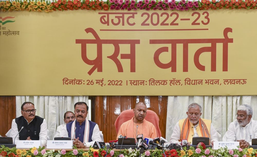 Lucknow: Uttar Pradesh Chief Minister Yogi Adityanath addresses a press conference after the presentation of the annual budget for 2022-23 in the UP Assembly, at Vidhan Bhawan in Lucknow, Thursday, May 26, 2022. State Finance Minister Suresh Kumar Khanna and Deputy CMs Keshav Prasad Maurya and Brajesh Pathak are also seen. (PTI Photo/Nand Kumar)