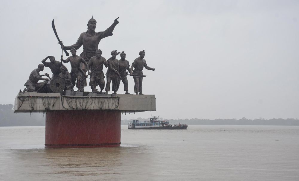 Guwahati: A passenger ferry crosses the River Brahmaputra amidst rainfall, in Guwahati, Friday, May 20, 2022. (PTI Photo)