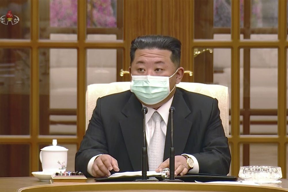 Pyongyang: In this image made from video broadcasted by North Korea's KRT, North Korean leader Kim Jong Un wears a face mask on state television during a meeting acknowledging the country's first case of COVID-19 Thursday, May 12, 2022, in Pyongyang, North Korea. North Korea imposed a nationwide lockdown Thursday to control its first acknowledged COVID-19 outbreak after holding for more than two years to a widely doubted claim of a perfect record keeping out the virus that has spread to nearly every place in the world. AP/PTI