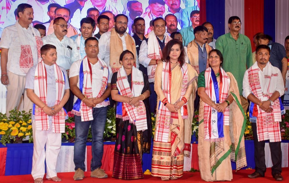 Guwahati: Assam Chief Minister Himanta Biswa Sarma with Asom Gana Parishad (AGP) President Atul Bora and AGP Working President Keshab Mahanta, poses for a photograph with newly elected Guwahati Municipal Corporation (GMC) councillors after felicitating them during a function, at AGP head office in Guwahati, Sunday, May 8, 2022. (PTI Photo)