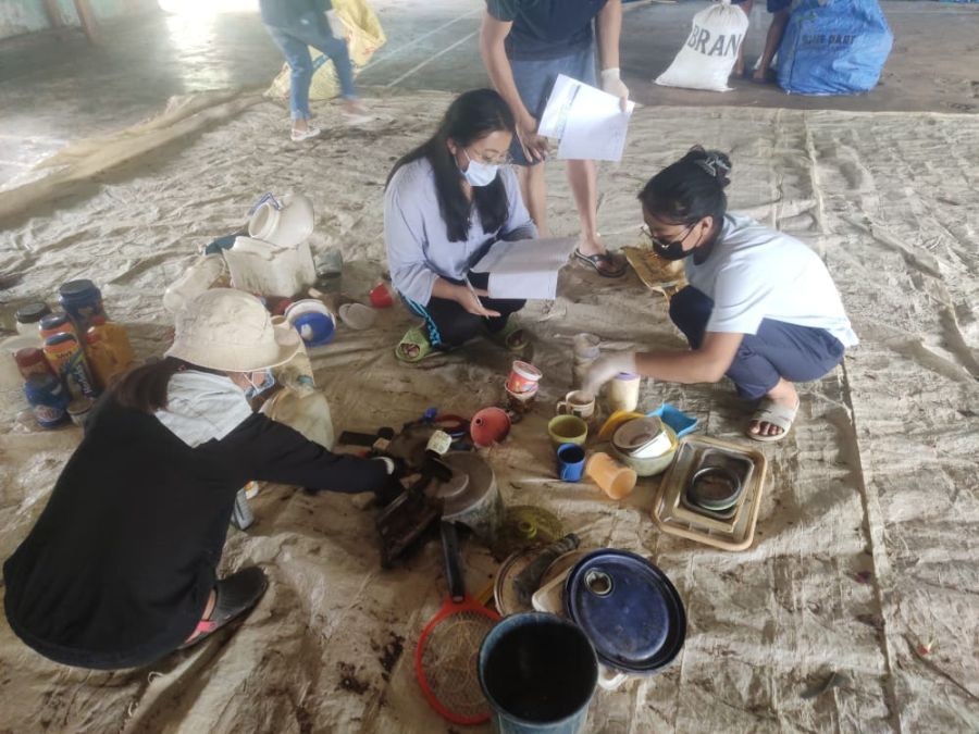 Volunteers segregating plastic waste in Chizami.